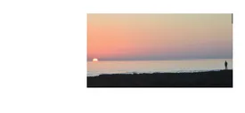 Coucher de soleil à La Rochelle Photographie d^{\prime}un coucher de soleil sur la mer à La Rochelle — exercice de maths en 3ème sur les coordonnées géographiques