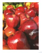 Étal de pommes rouges Pommes rouges sur un étal de magasin — exercice de maths en 6ème sur la proportionnalité et le prix au kilogramme